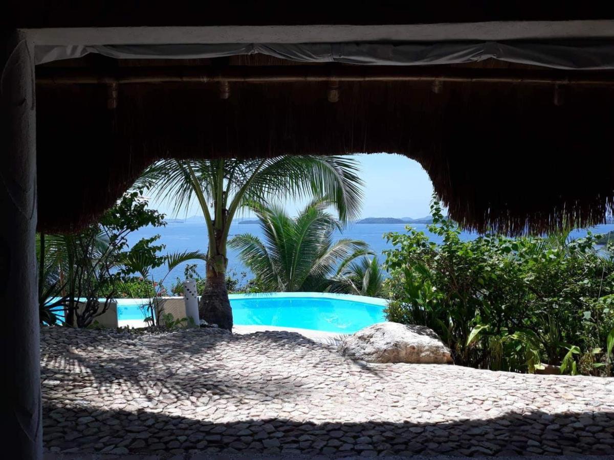 Al Faro Cosmio Hotel Palawan Бусуанга Экстерьер фото