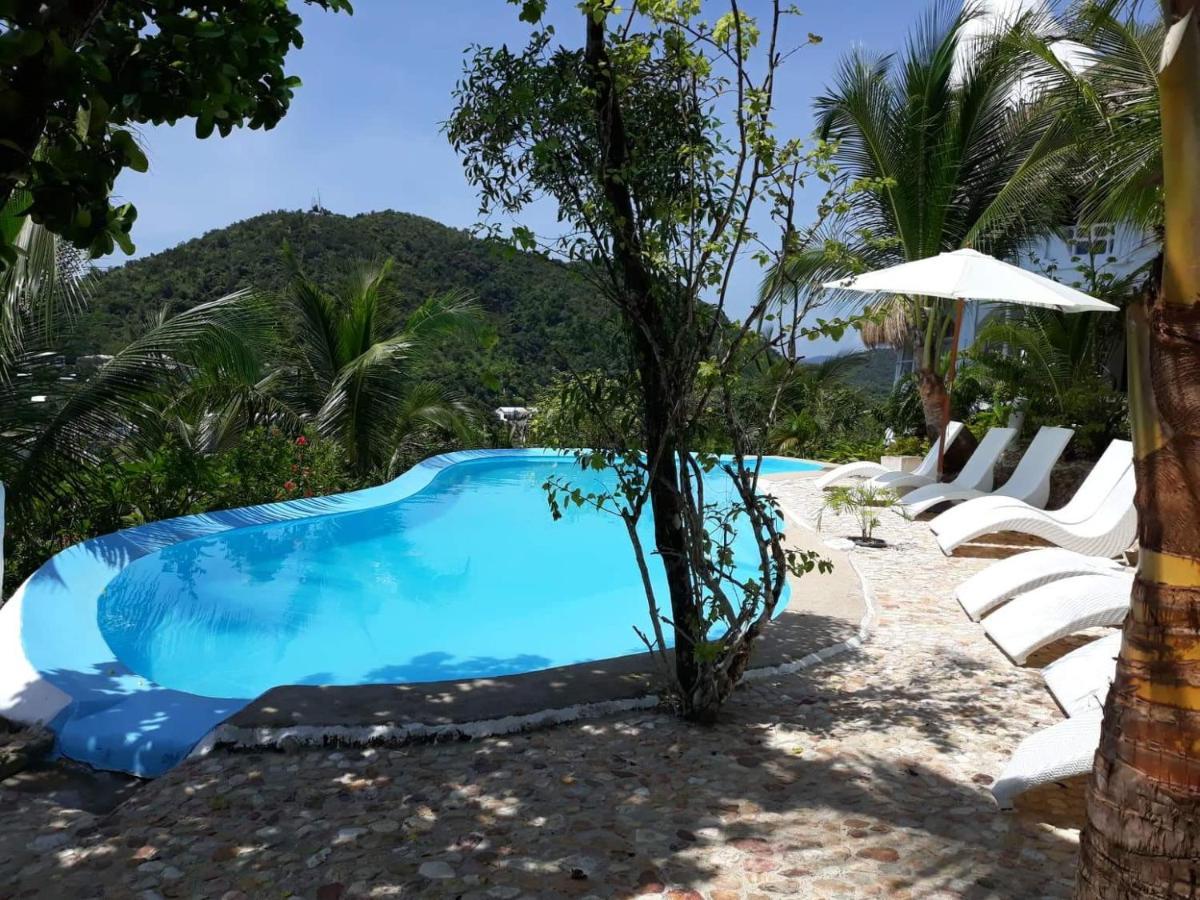 Al Faro Cosmio Hotel Palawan Бусуанга Экстерьер фото
