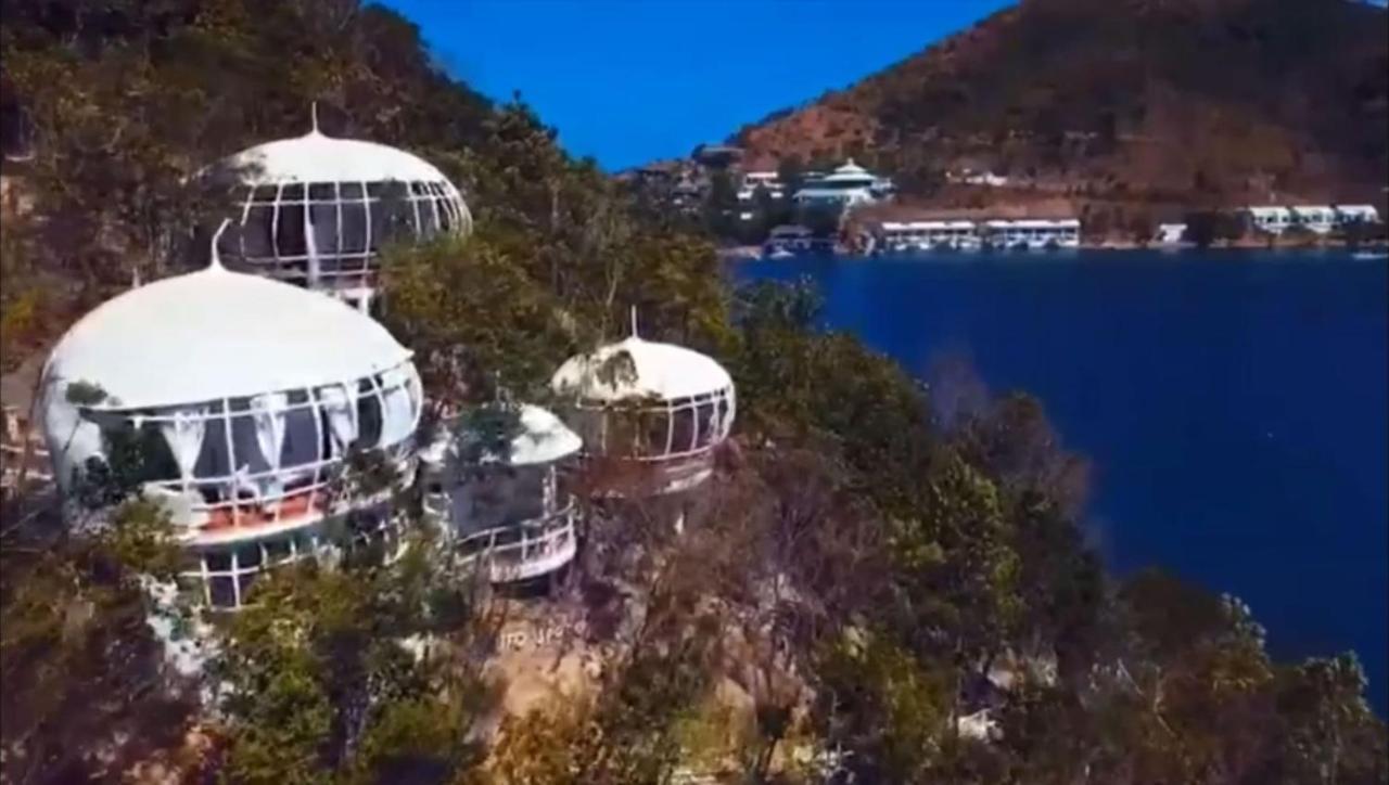 Al Faro Cosmio Hotel Palawan Бусуанга Экстерьер фото